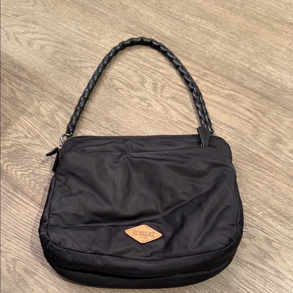 MZ Wallace small Bowery crossbody bag in black nylon with Italian leather trim.